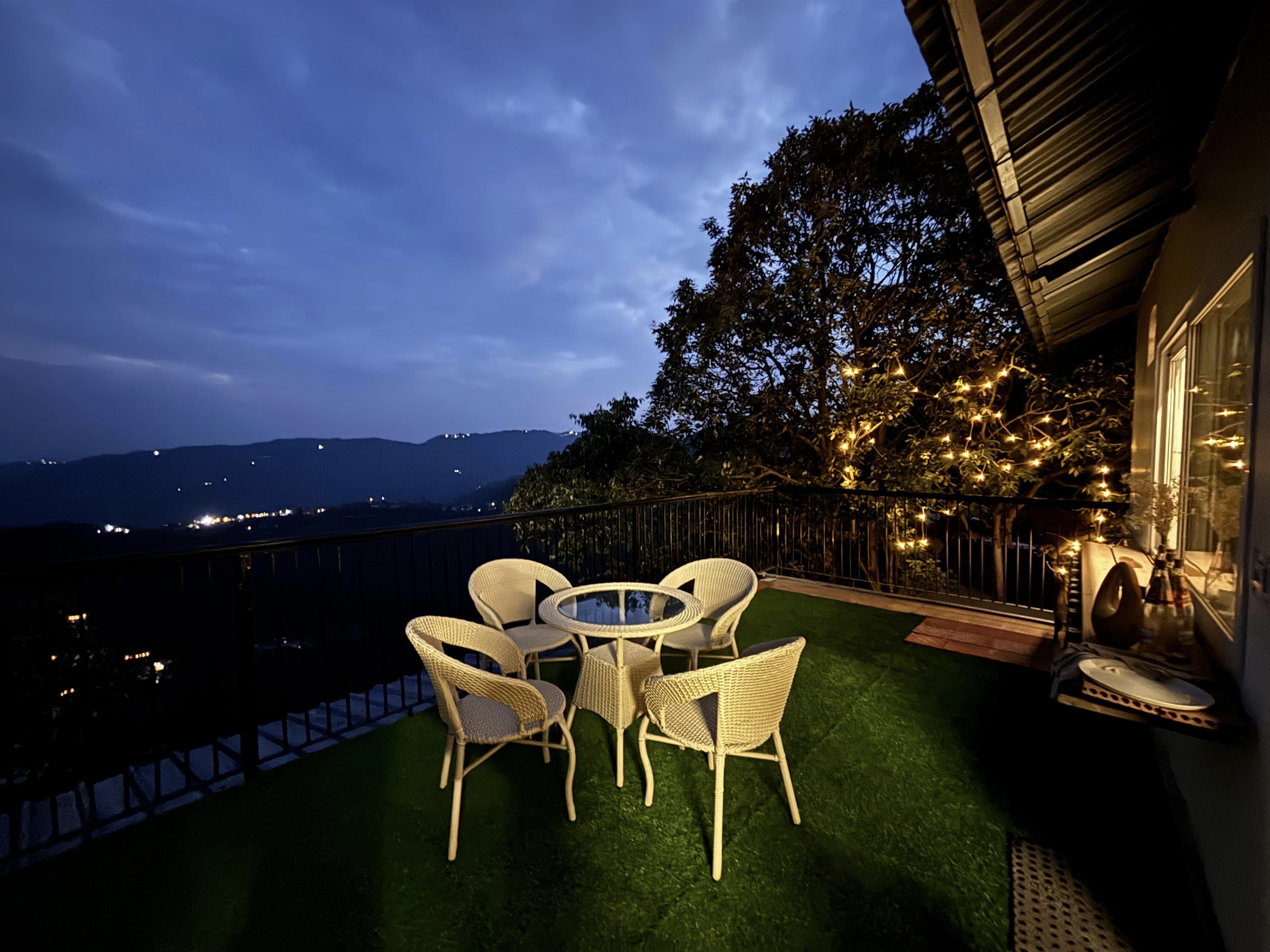 Balcony at night with valley lights